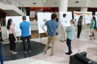 Students attending the Aquatic Chemical Ecology REU prepare for poster session presentations July 20. (Photo Renay San Miguel)