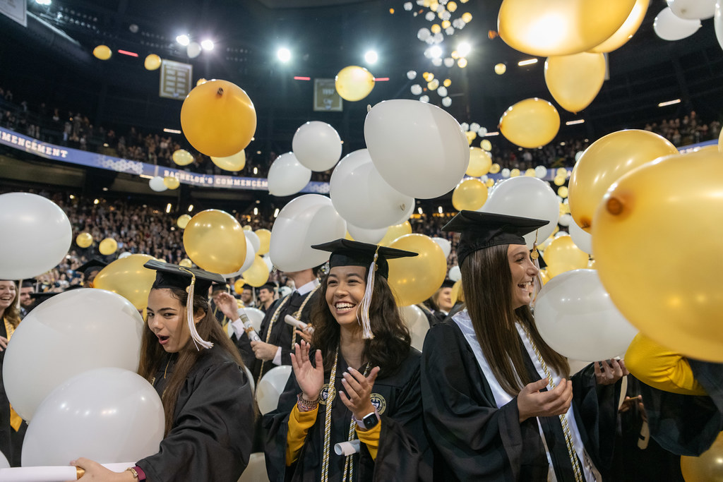 students celebrating graduation