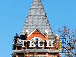 Brick tower with words spelling out Tech