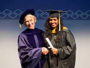 Dean Lozier congratulates a newly minted College of Sciences alum.