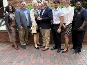 7 people standing in a line