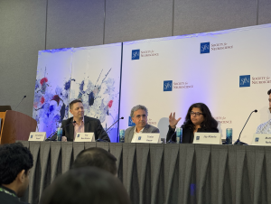 Trisha Kesar answers a question during the SfN press conference on AI in neuroscience, moderated by Chris Rozell.