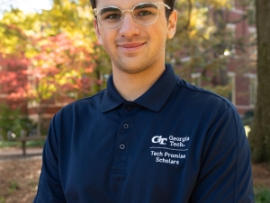 Nick Fabrizio wearing a blue Tech Promise shirt