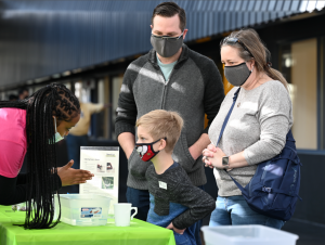 Atlanta Science Festival Demo 2022 Family learning at demo booth