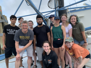 School of Biological Sciences Associate Professor Brian Hammer (2nd from left), teaching assistant Ahn Pham (3rd from left) and nine 2022 Aquatic Chemical Ecology (ACE) REU students on a trawl along the Georgia coast.