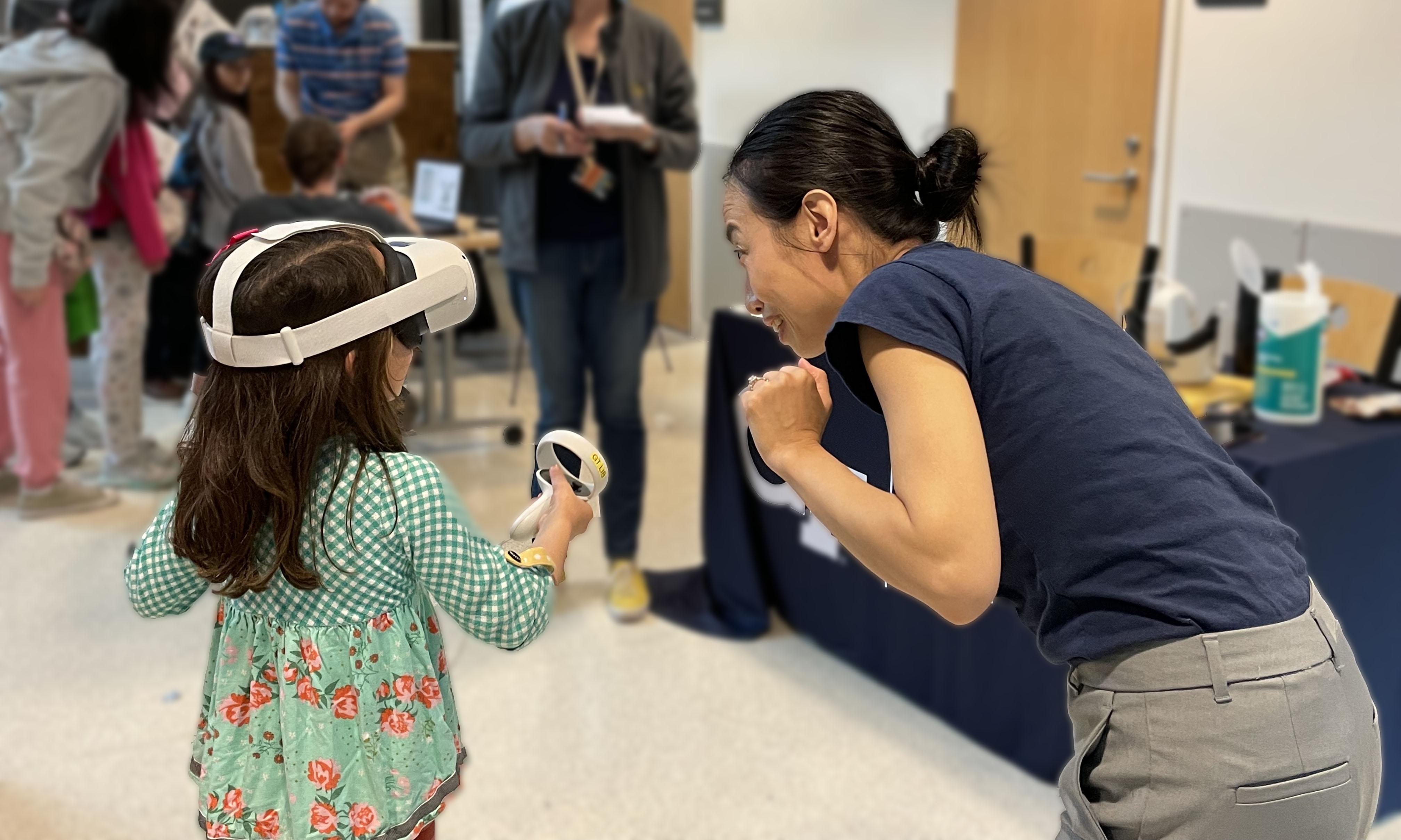 A young participant experiencing virtual reality for the first time.